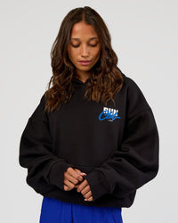 Woman wearing Run Club Script Oversized Hoodie - Black-Palace Blue | Model:Dakota | Size:XS
