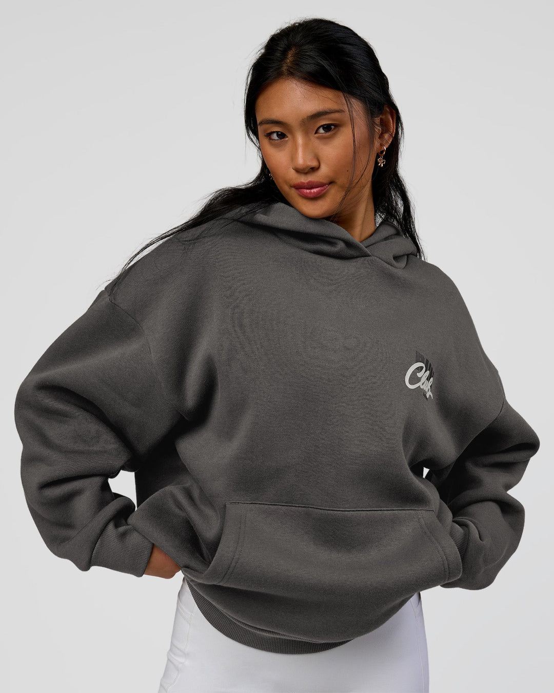 Woman wearing Run Club Script Oversized Hoodie - Dark Storm-Alloy | Model:Loren | Size:XS