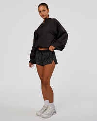 Woman wearing Run Light Jacket - Black | Model:Brylee | Size:XS