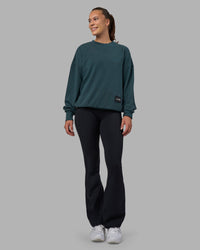Woman wearing Segmented Oversized Sweater - Abyssal | Model:Charlize | Size:XS