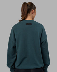Woman wearing Segmented Oversized Sweater - Abyssal | Model:Charlize | Size:XS