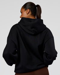 Woman wearing Shadow Mode Oversized Hoodie - Black | Model:Rosie | Size:XS | Thumbnail Index: 8