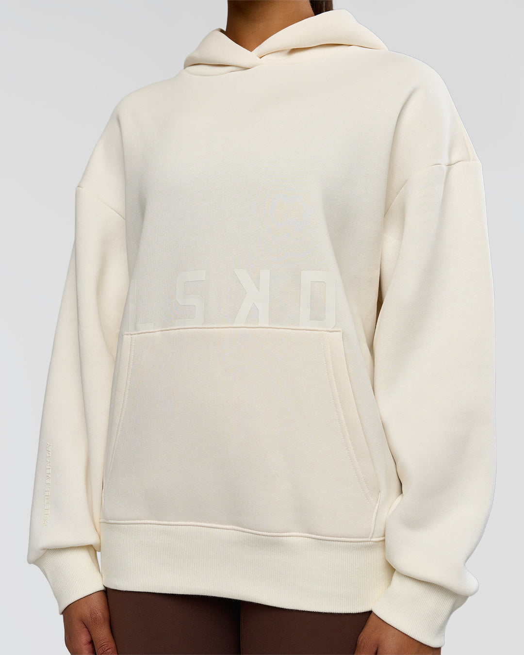 Woman wearing Shadow Mode Oversized Hoodie - Off White | Model:Rosie | Size:XS
