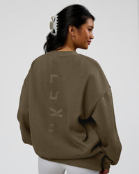 Woman wearing Shadow Mode Oversized Sweater - Walnut Grey | Model:Alex | Size:XS