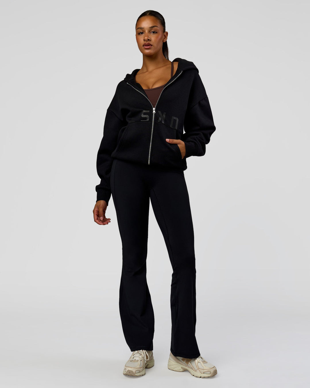 Woman wearing Shadow Mode Oversized Zip Through Hoodie - Black | Model:Rosie | Size:XS