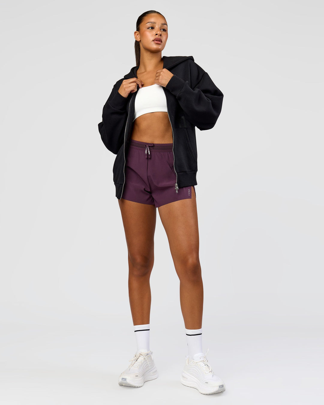 Woman wearing Shadow Mode Oversized Zip Through Hoodie - Black | Model:Rosie | Size:XS
