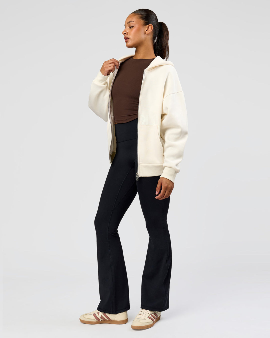 Woman wearing Shadow Mode Oversized Zip Through Hoodie - Off White | Model:Rosie | Size:XS - view 8
