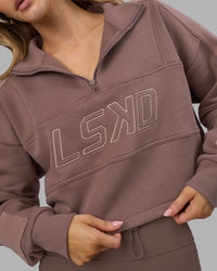 Woman wearing Slam Quarter Zip Sweater - Peppercorn | Model:Leilani | Size:XS