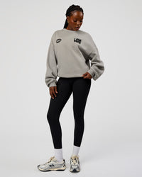 Woman wearing Static Grit Boxy Crew - Alloy-Black | Model:Ellie | Size:XS