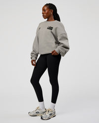 Woman wearing Static Grit Boxy Crew - Alloy-Black | Model:Ellie | Size:XS