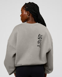 Woman wearing Static Grit Boxy Crew - Alloy-Black | Model:Ellie | Size:XS