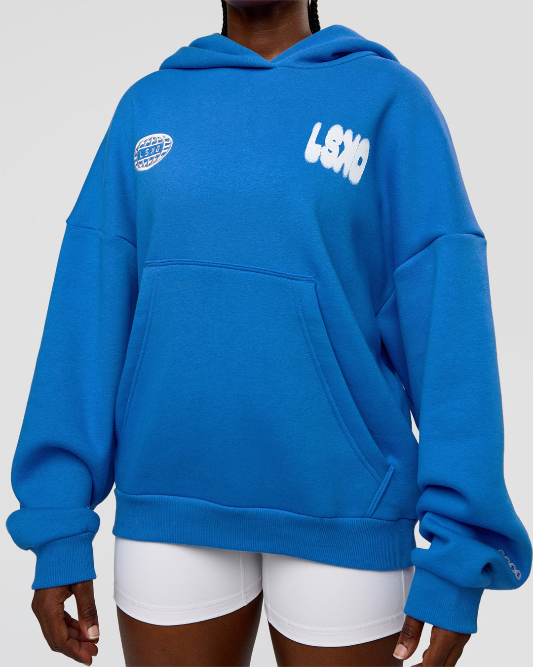 Woman wearing Static Grit Unisex Boxy Hoodie - Palace Blue-White | Model:Ellie | Size:XS