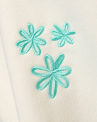 Woman wearing Sticker Unisex Oversized Hoodie - Off White-Jelly Mint | Model:Amity | Size:XS