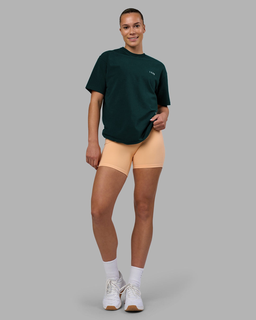 Woman wearing Think Strong Heavyweight FLXCotton Tee Oversize - Dark Moss-Off White | Model:Charlize | Size:XS