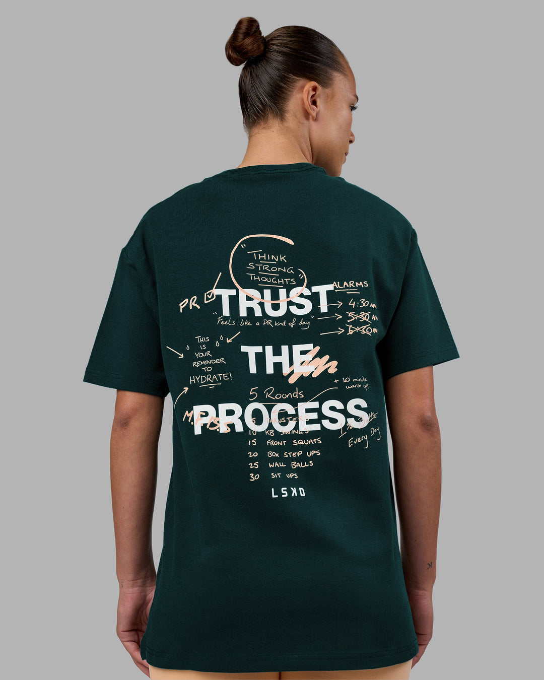 Woman wearing Think Strong Heavyweight FLXCotton Tee Oversize - Dark Moss-Off White | Model:Charlize | Size:XS