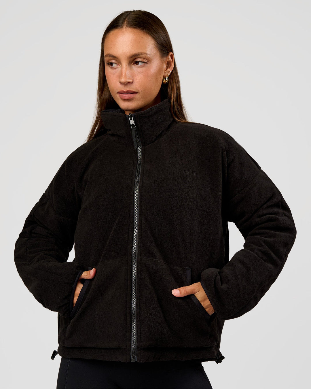 Woman wearing Thrive Reversible Jacket - Black | Model:Brylee | Size:XS