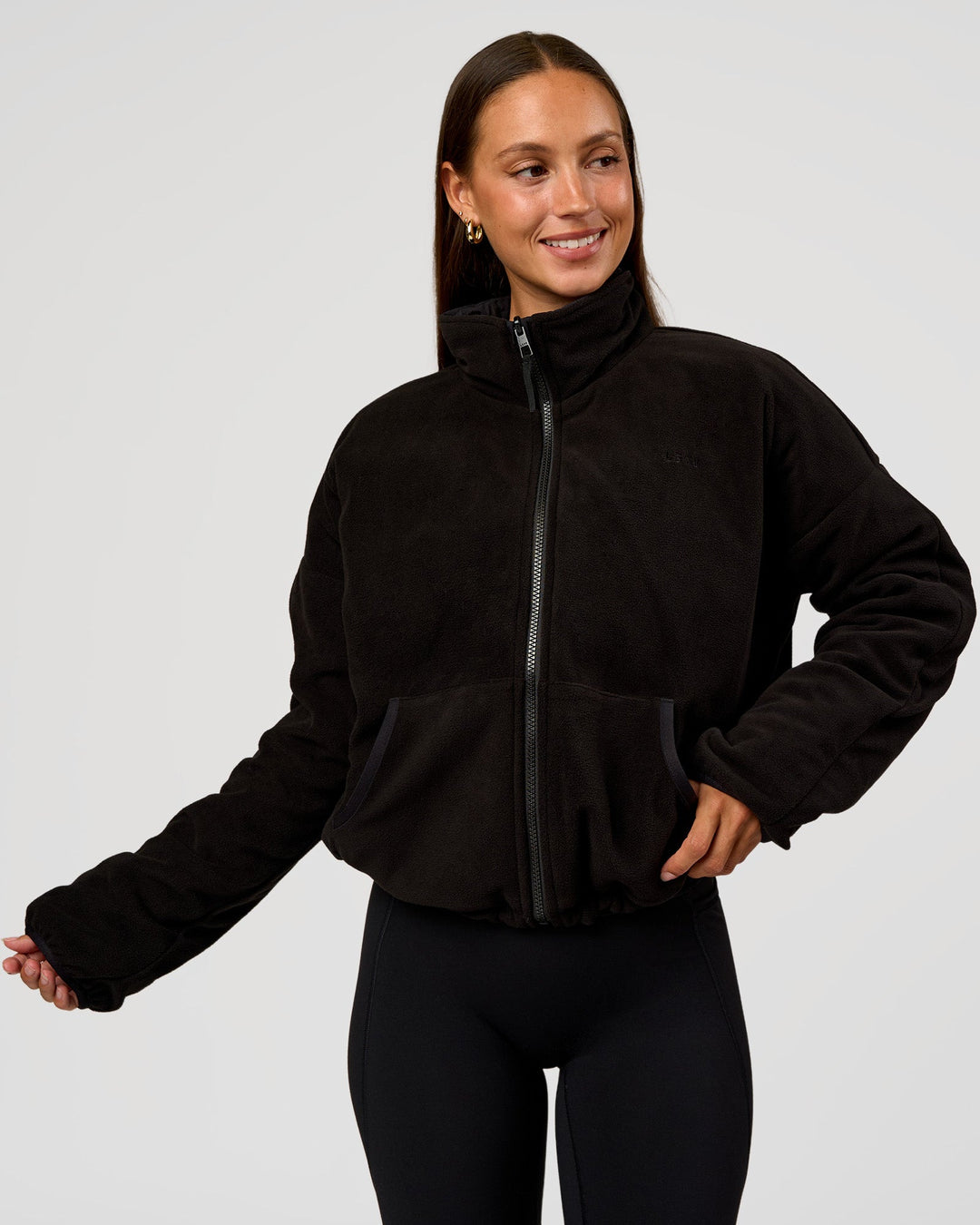 Woman wearing Thrive Reversible Jacket - Black | Model:Brylee | Size:XS