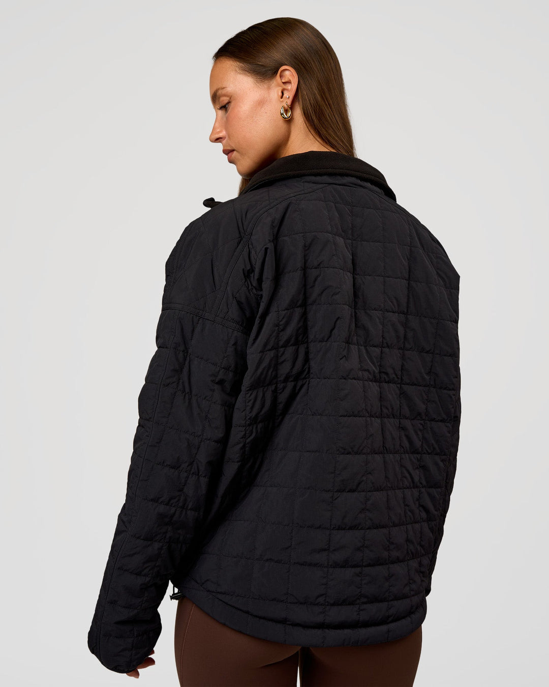 Woman wearing Thrive Reversible Jacket - Black | Model:Brylee | Size:XS
