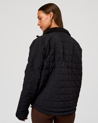 Woman wearing Thrive Reversible Jacket - Black | Model:Brylee | Size:XS