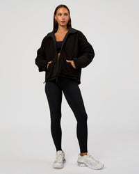 Woman wearing Thrive Reversible Jacket - Black | Model:Brylee | Size:XS