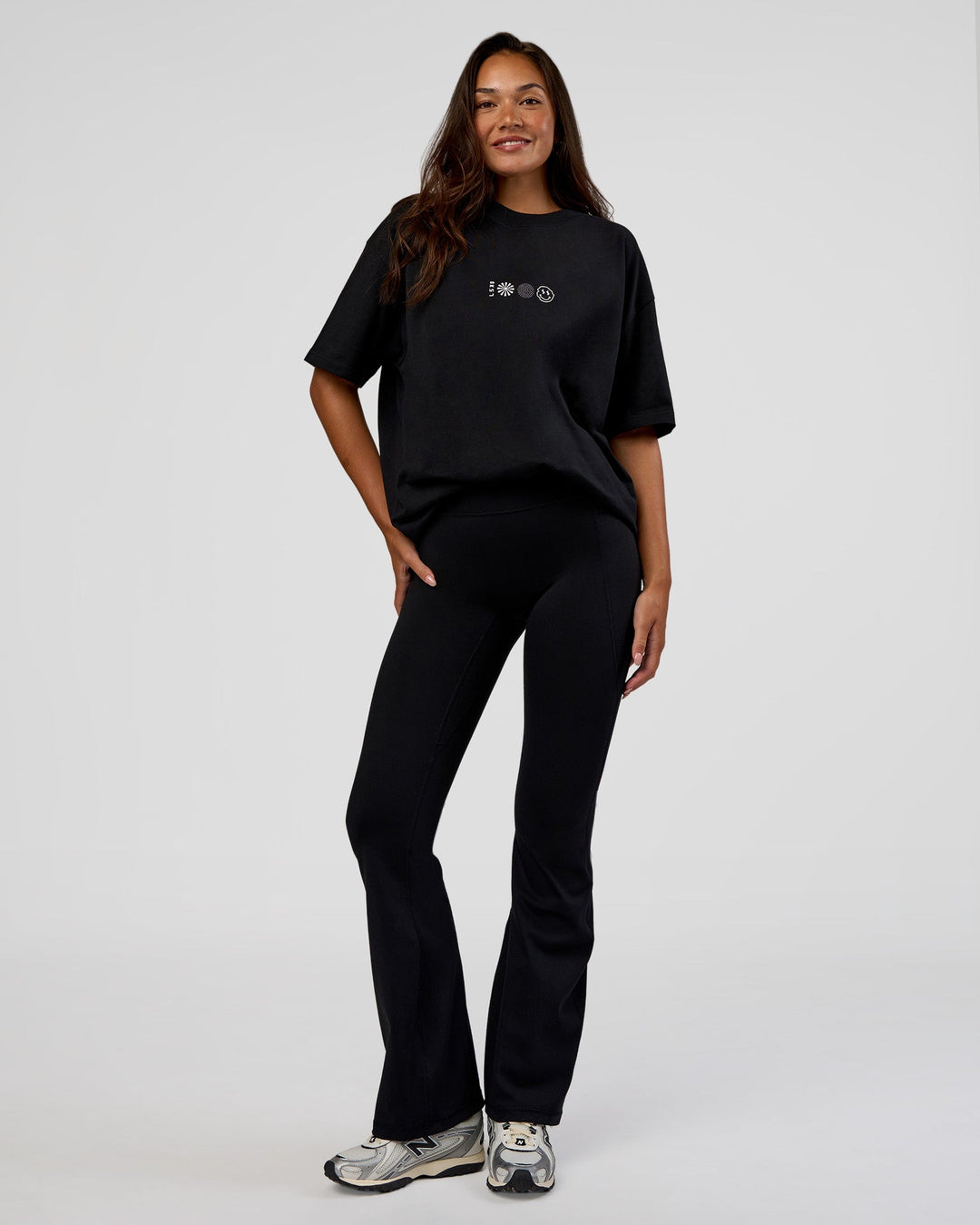 Woman wearing Trust The Process Heavyweight Unisex Oversized Tee - Black-White | Model:Kirstyn | Size:XS