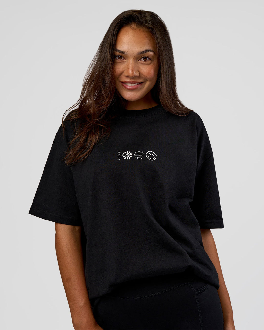 Woman wearing Trust The Process Heavyweight Unisex Oversized Tee - Black-White | Model:Kirstyn | Size:XS