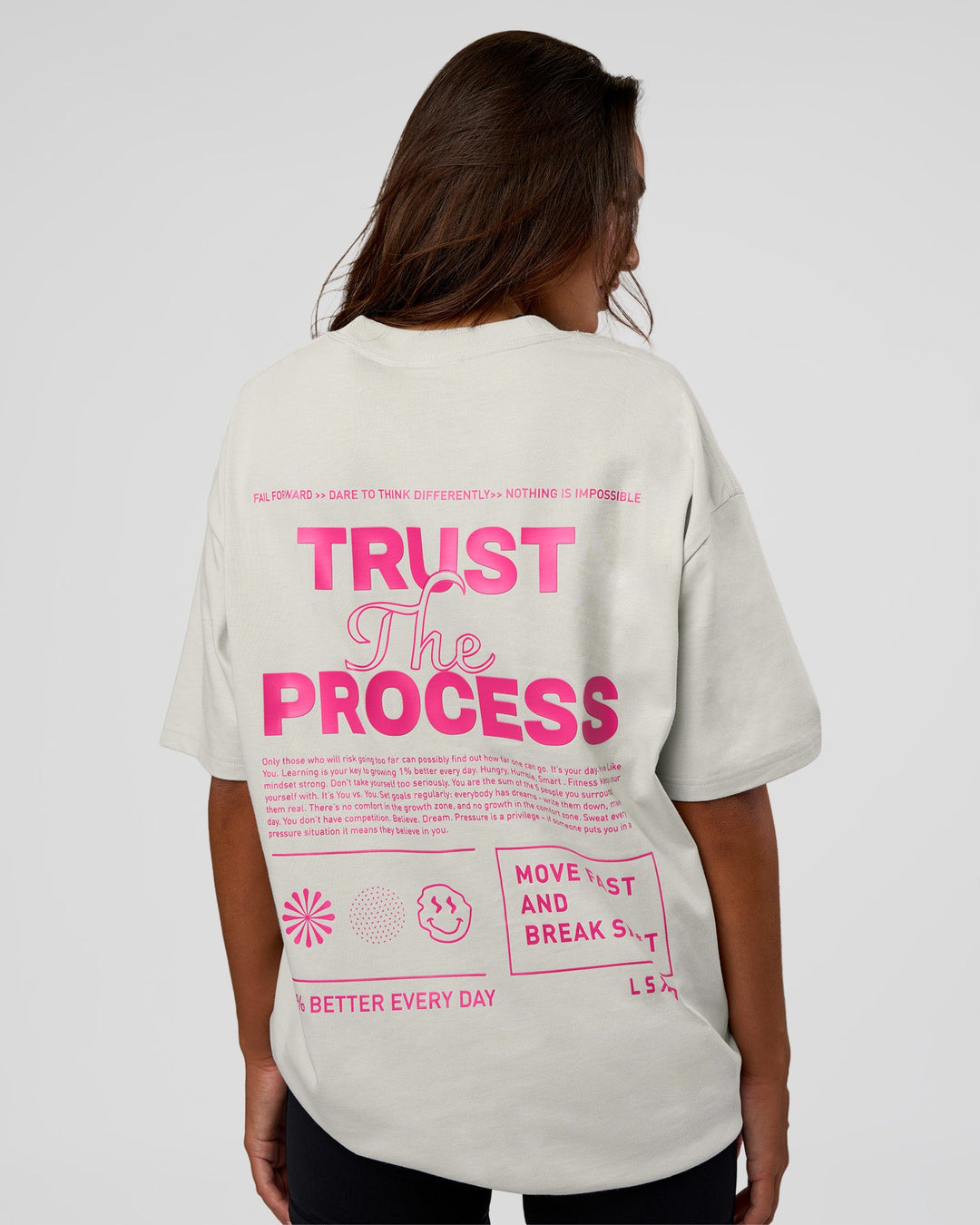 Woman wearing Trust The Process Heavyweight Unisex Oversized Tee - Digital Mist-Ultra Pink | Model:Kirstyn | Size:XS