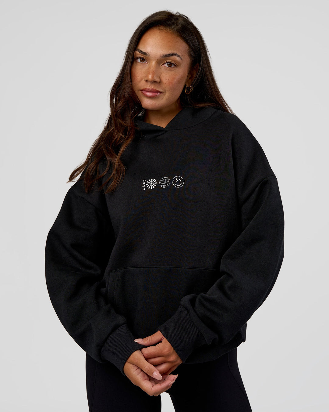 Woman wearing Trust The Process Unisex Oversized Hoodie - Black-White | Model:Kirstyn | Size:XS