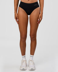 Woman wearing Turbo Track Brief in Black | Model:Txai | Size:XS