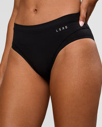 Woman wearing Turbo Track Brief in Black | Model:Txai | Size:XS
