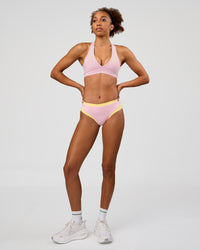 Woman wearing Turbo Track Brief in Marshmallow-Lemon | Model:Txai | Size:XS
