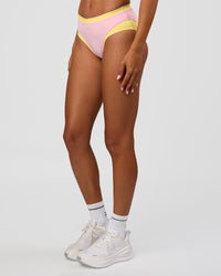 Woman wearing Turbo Track Brief in Marshmallow-Lemon | Model:Txai | Size:XS