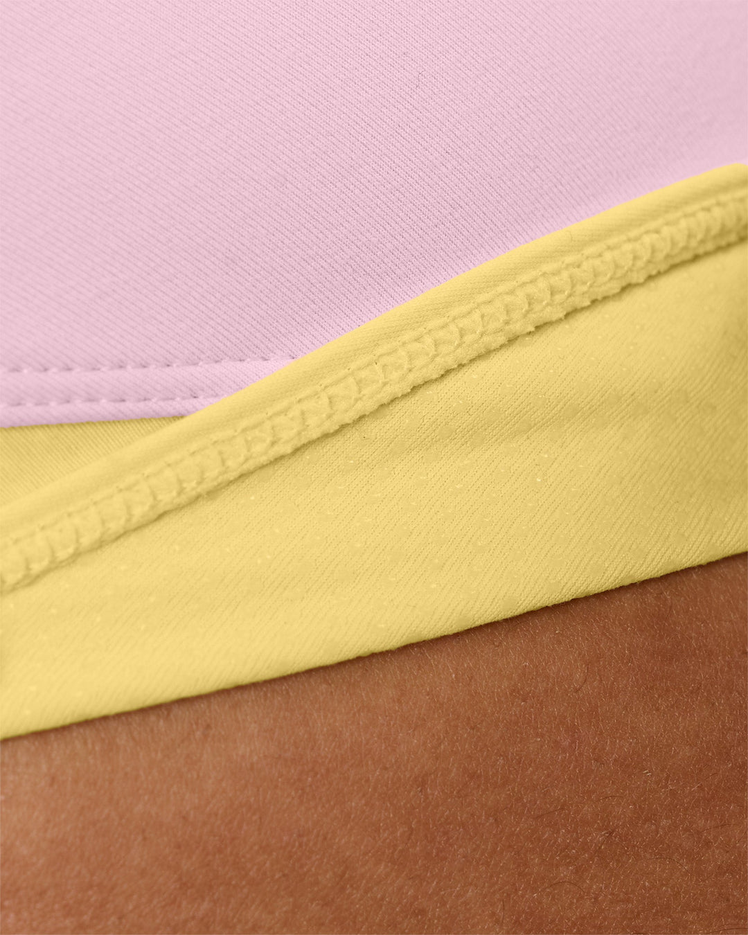 Woman wearing Turbo Track Brief in Marshmallow-Lemon | Model:Txai | Size:XS