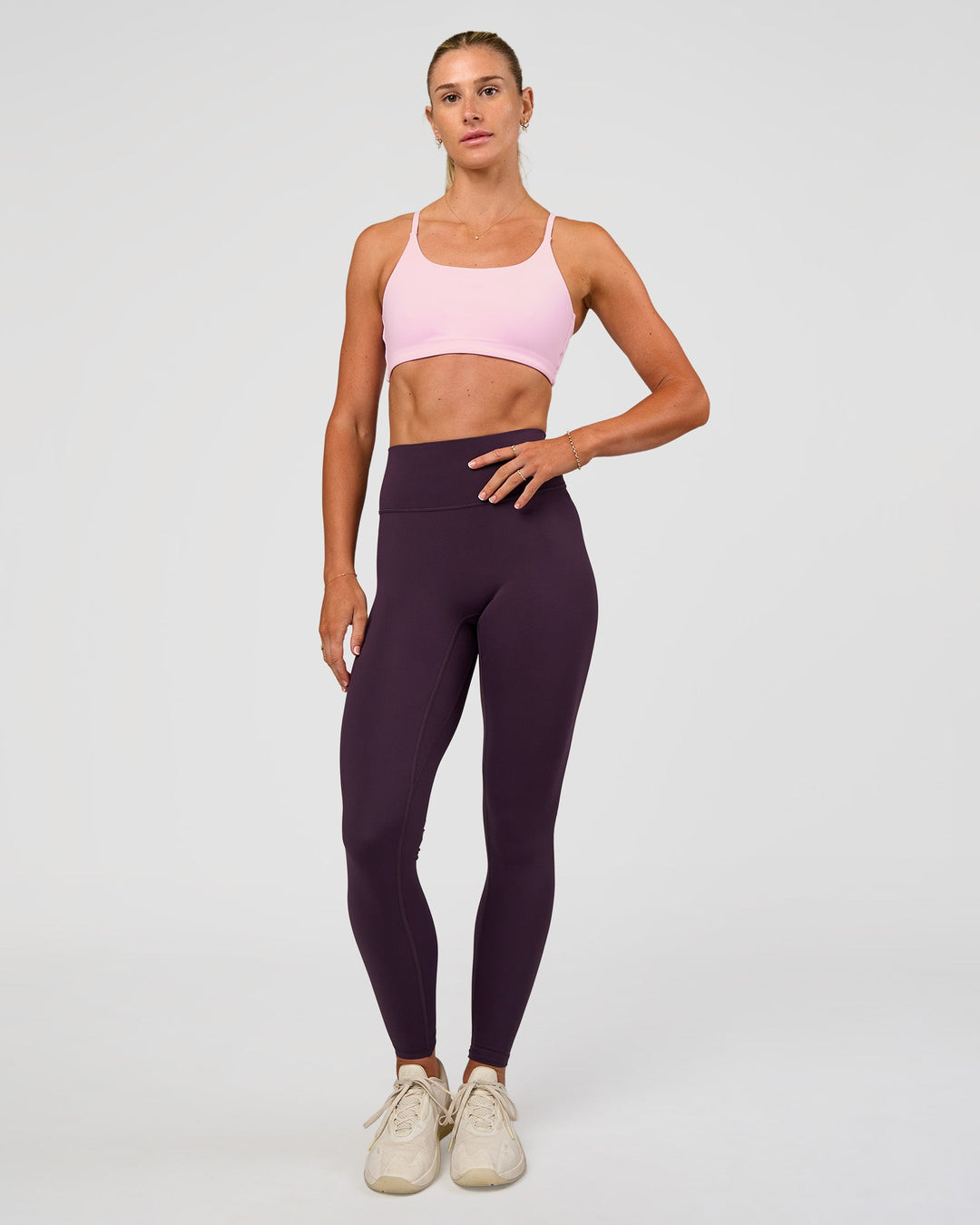 Woman wearing Twist Sports Bra - Marshmallow | Model:Emelia | Size:XS