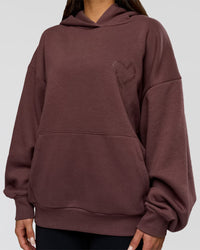Woman wearing Unisex Love The Process Oversize Hoodie - Cocoa Powder-Hot Chocolate | Model:Bianca | Size:XS
