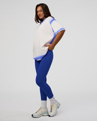 Woman wearing Urban Blur Heavyweight Unisex Oversized Tee - Off White-Power Cobalt | Model:Kirstyn | Size:XS