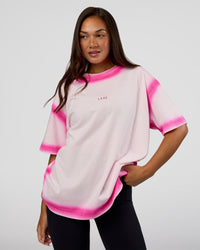 Woman wearing Urban Blur Heavyweight Unisex Oversized Tee - Off White-Ultra Pink | Model:Kirstyn | Size:XS