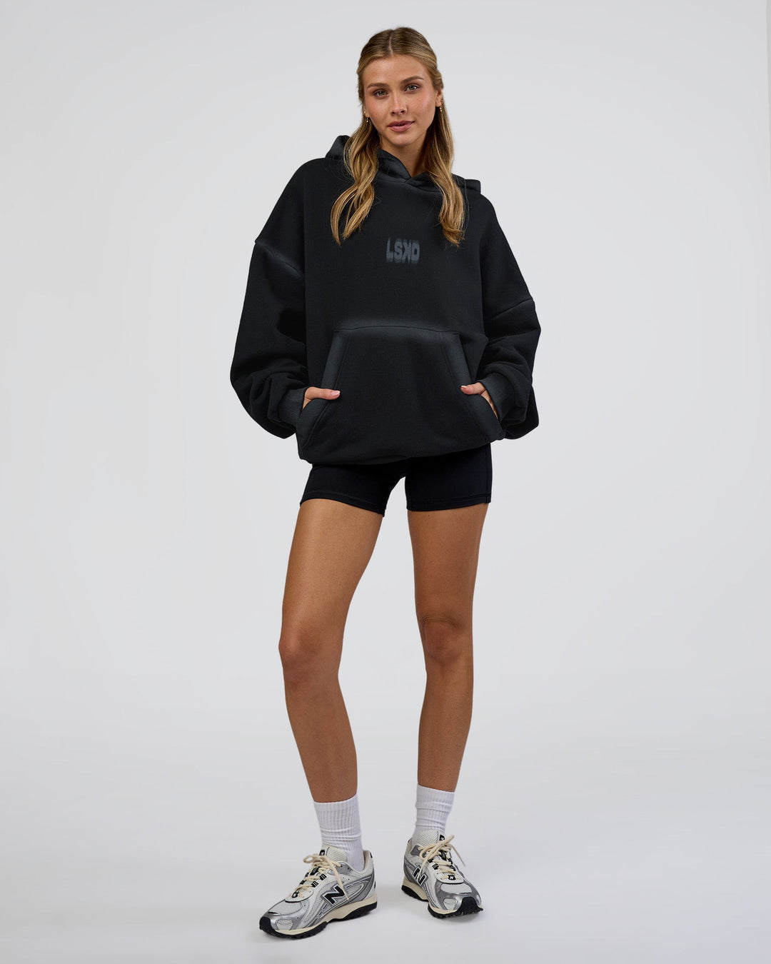 Woman wearing Urban Blur Unisex Oversized Hoodie - Black-Dark Storm | Model:Leilani | Size:XS