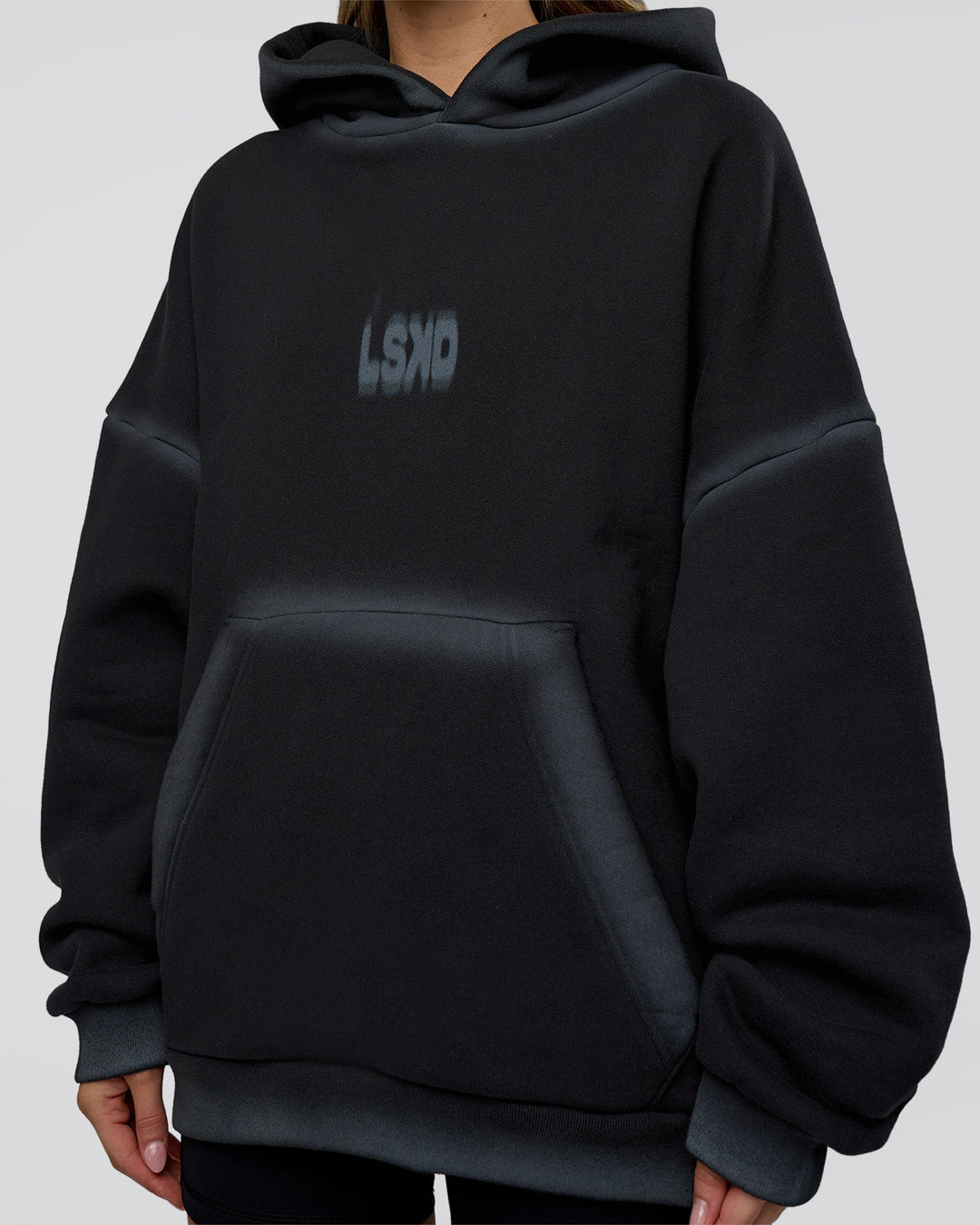 Woman wearing Urban Blur Unisex Oversized Hoodie - Black-Dark Storm | Model:Leilani | Size:XS