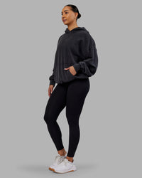 Woman wearing Variation Washed Oversized Hoodie - Black-Black | Model:Ayla | Size:XS