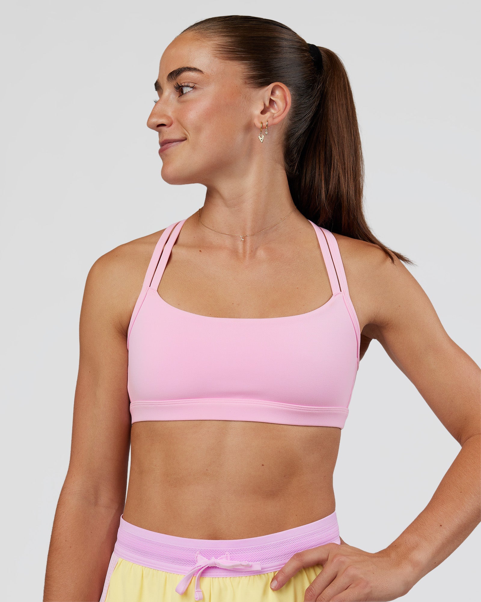 Woman wearing Velocity Sports Bra - Marshmallow | Model:Grace | Size:XS