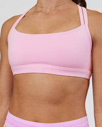 Woman wearing Velocity Sports Bra - Marshmallow | Model:Grace | Size:XS