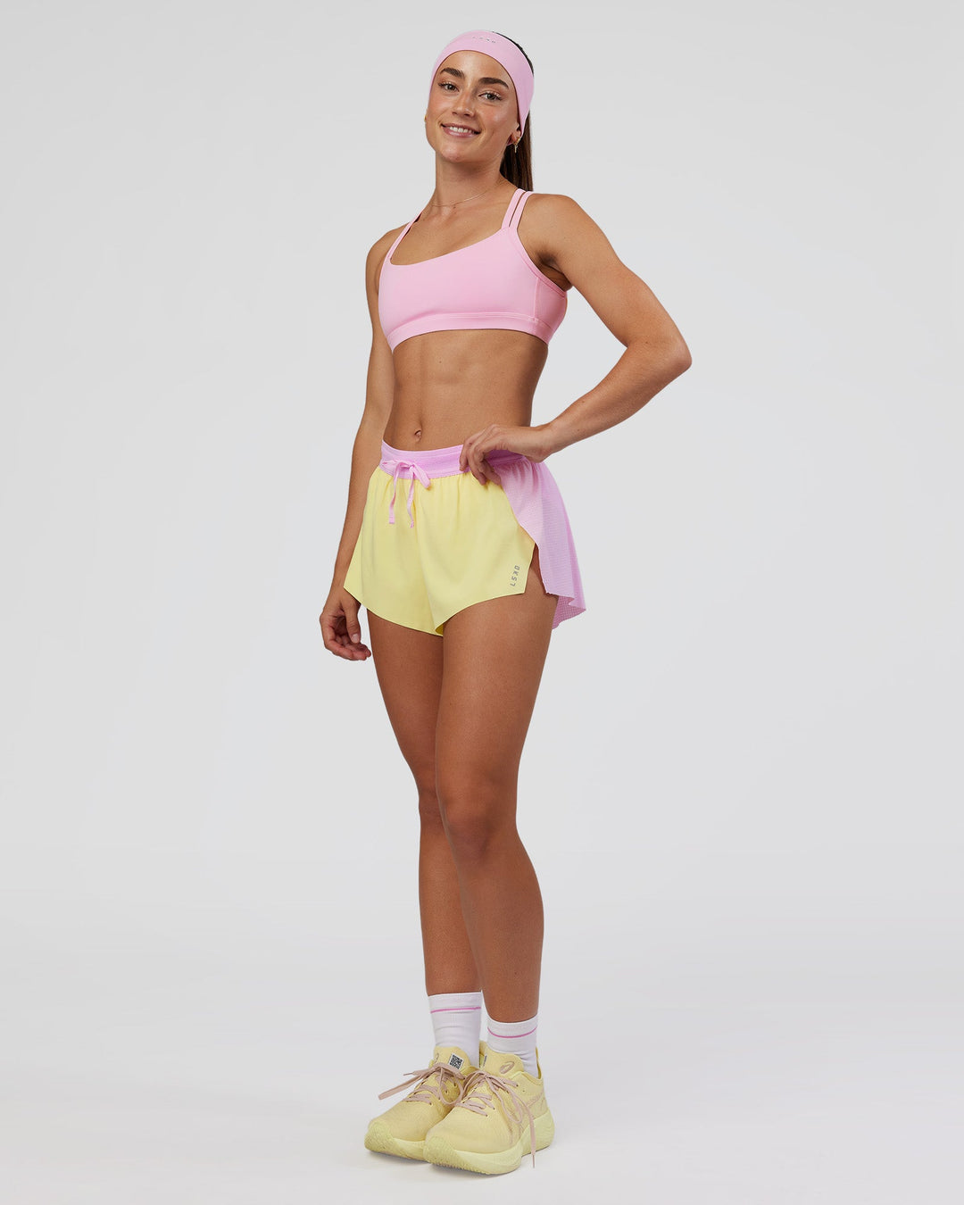 Woman wearing Velocity Sports Bra - Marshmallow | Model:Grace | Size:XS
