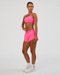 Woman wearing Velocity Sports Bra - Sugar Plum | Model:Brylee | Size:XS