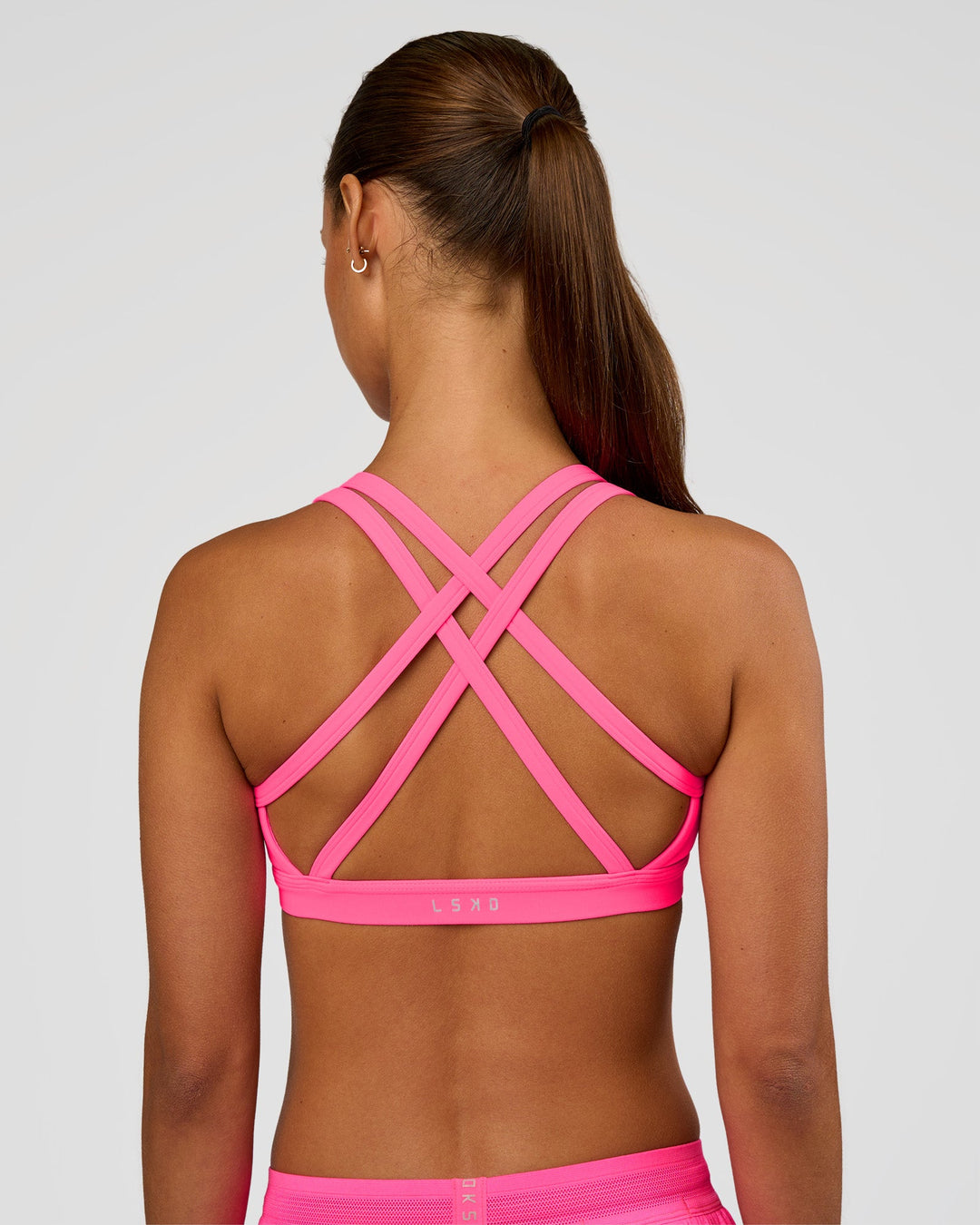 Woman wearing Velocity Sports Bra - Sugar Plum | Model:Brylee | Size:XS