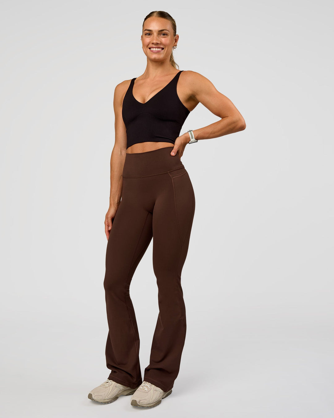 Woman wearing Vitality Long Line Sports Bra - Black | Model:Maja | Size:XS