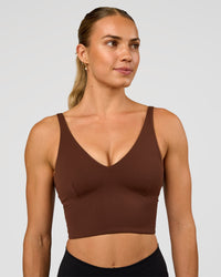 Woman wearing Vitality Long Line Sports Bra - Hot Chocolate | Model:Maja | Size:XS