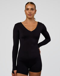 Woman wearing Vitality Long Sleeve Bodysuit - Black | Model:Maja | Size:XS