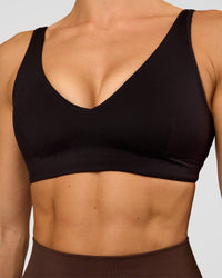 Woman wearing Vitality Sports Bra - Black | Model:Maja | Size:XS | Thumbnail Index: 0