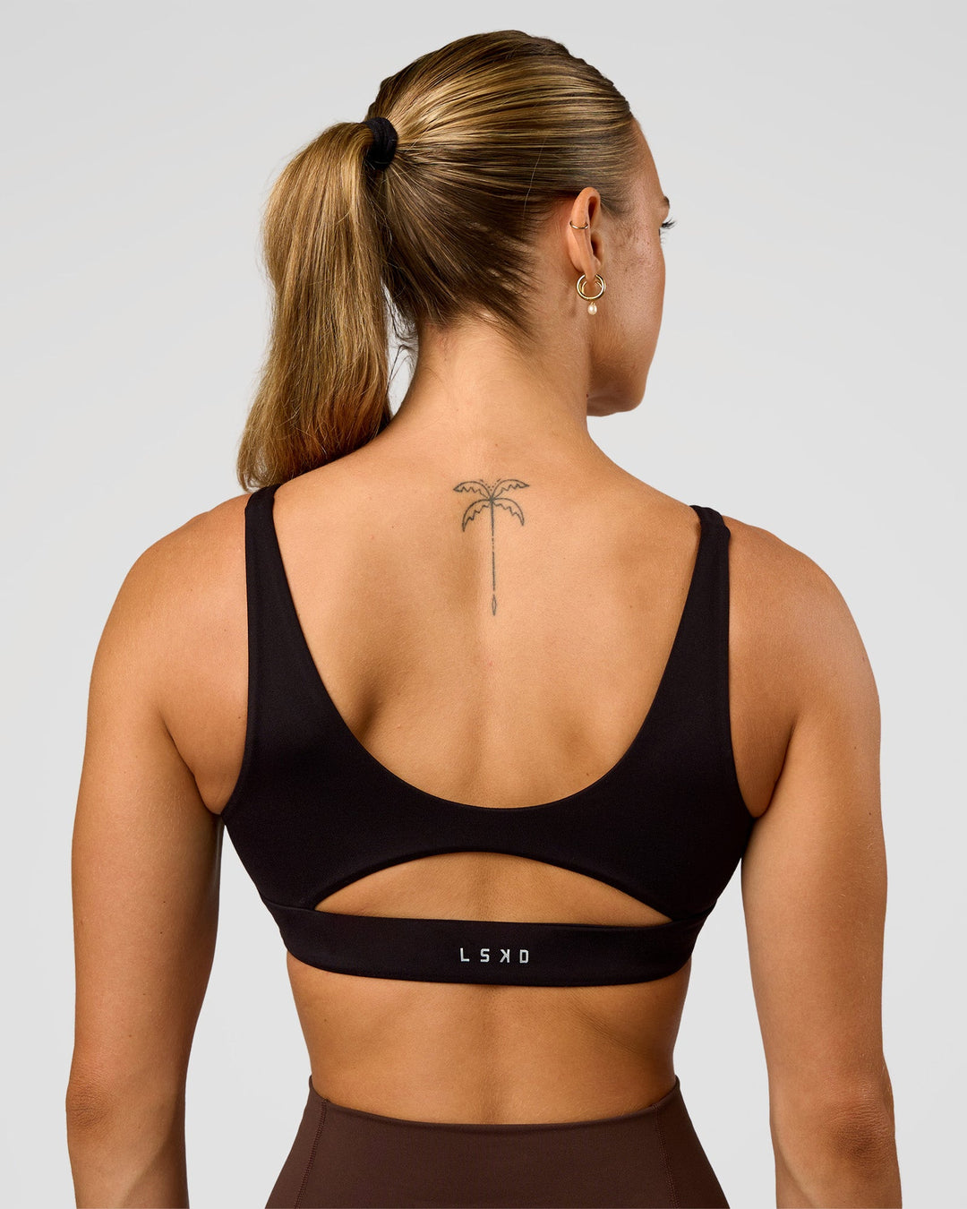 Woman wearing Vitality Sports Bra - Black | Model:Maja | Size:XS - view 2